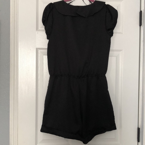 Rampage Romper black with ruffle and tie down front. - Picture 5 of 8